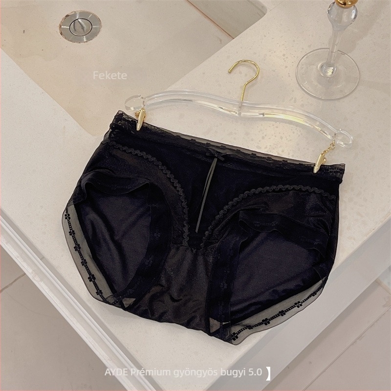 Női hálószövésű alsó középső derekú, lélegző, antibakteriális, nylon anyag, alsó csúcsban mulberry selyem betét, csipkés masni részlettel