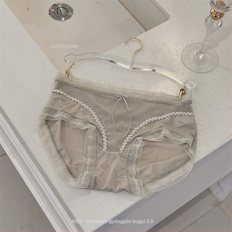 Női hálószövésű alsó középső derekú, lélegző, antibakteriális, nylon anyag, alsó csúcsban mulberry selyem betét, csipkés masni részlettel