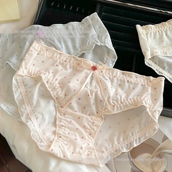 Női háromszög alakú alsónemű pöttyös mintával, középmagas derék, poliészter anyag pamuttal bélelt, lélegző és antibakteriális