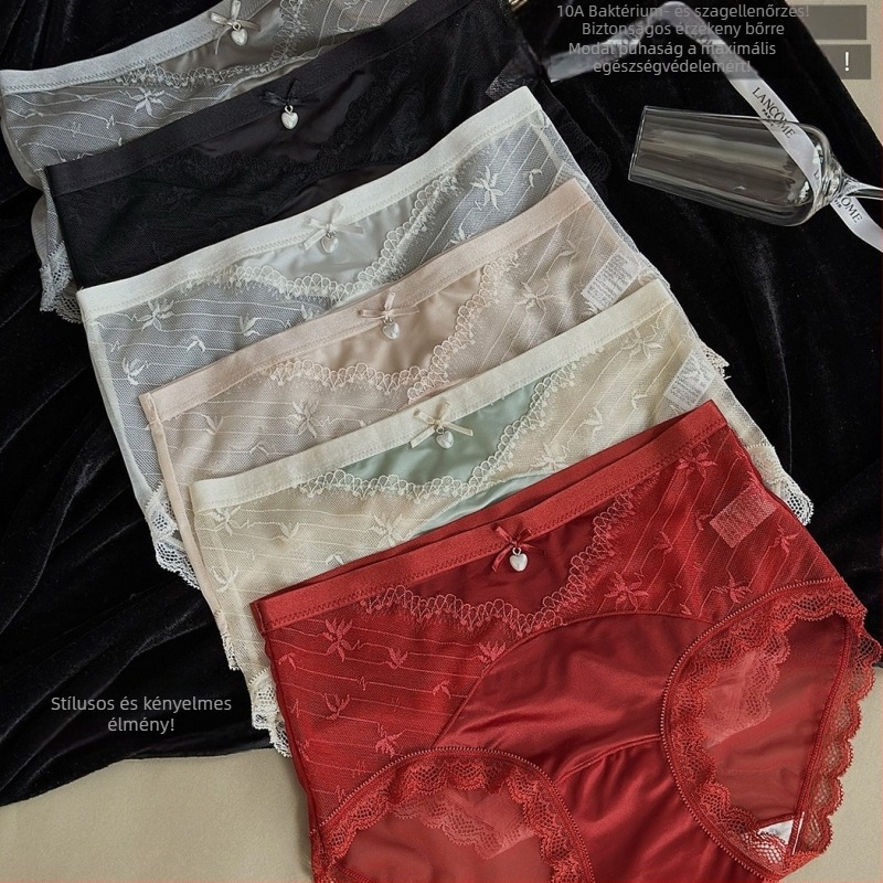 Női középmagasságú nylon bugyi, lélegző, gyorsan száradó kötött anyagból, egyszínű, belső modal bélés