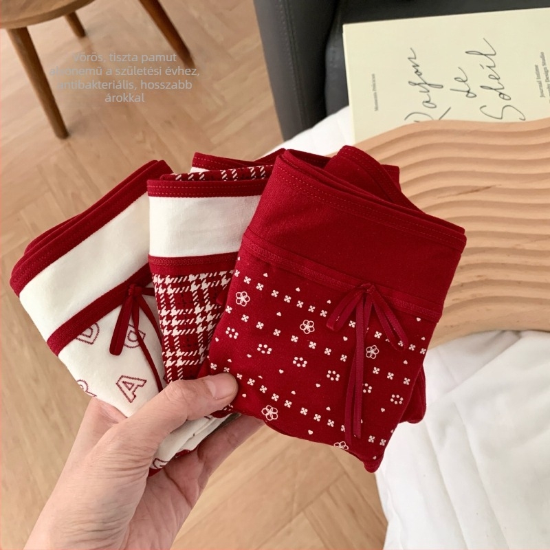 Női pamut alsónemű, középmagasságú derékkal, kötött anyag, fő összetétel 95–100% pamut