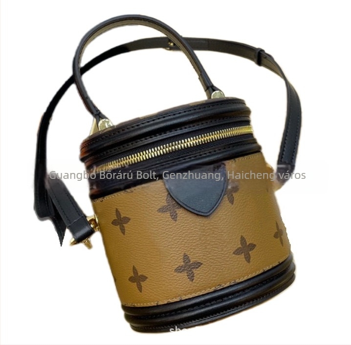 Női cilindrikus bucket táska mini mintával, PVC anyag, poliészter bélés, cipzárral záródó, belső cipzáras zseb és telefontartó rekesz