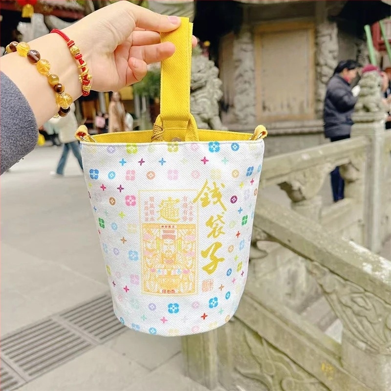 Dongmei bucket bag — vászon, mágneszár, tavasz 2025