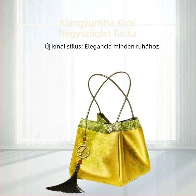 Női kézitáska selyemből, vízszintes négyzet alakú, belső cipzáras rekesz, belső bélés: Poliészter, puha szerkezet (Anyag: Selyem; Alak: Vízszintes négyzet; Belső cipzáras rekesz; Bélés: Poliészter; Puha szerkezet)