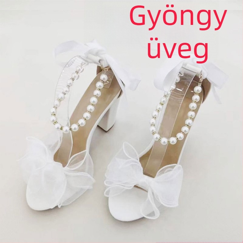 Vanessa pántos szandál masnival és gyöngyökkel, üreges kialakítás, kerek orr, rendkívül magas vastag sarok