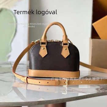Valódi bőrből készült kagyló alakú táska, nylon bélés, cipzáras záródás, egy vállpánt