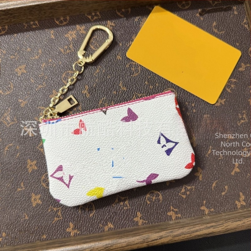 Fehér háromszínű rúzstáska monogrammal és all-over mintával, mini érme- és kártyatartó