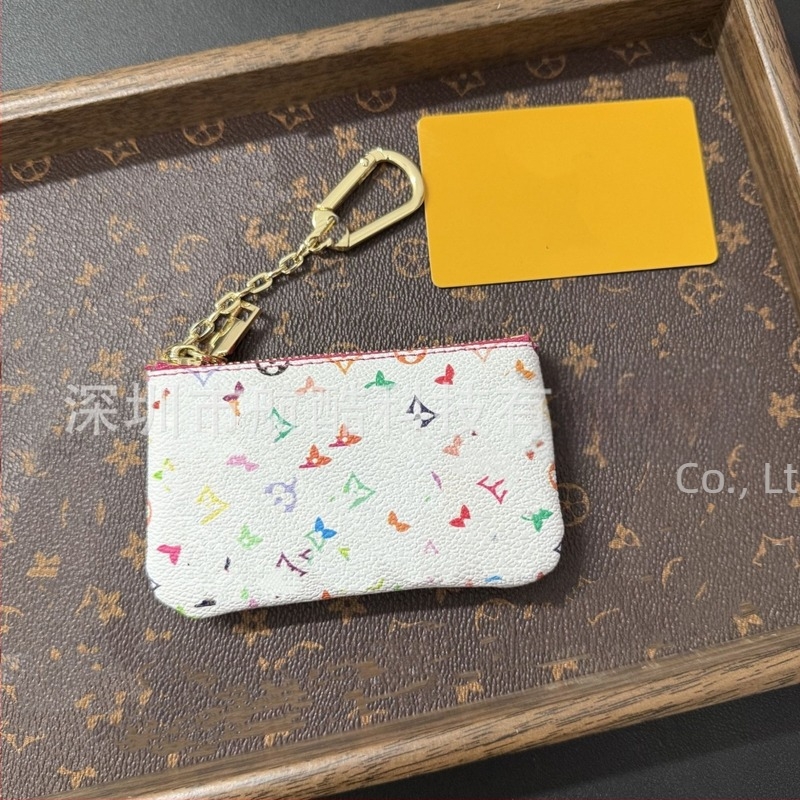 Fehér háromszínű rúzstáska monogrammal és all-over mintával, mini érme- és kártyatartó
