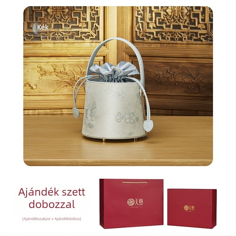 Vödörtáska marhabőrből és textil alapanyagból, irodalmi nemzeti stílus, húzózsinóros záródás, poliészter bélés