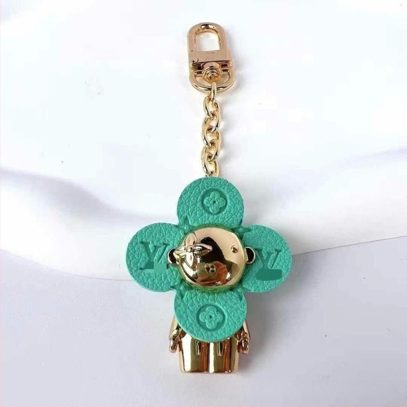 Ötvözetből készült négylevelű lóhere hátizsák medál és kulcstartó — fémdísz