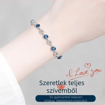 Igazolt ezüst 999 női karkötő kristályos Óceán Szívével, platina színű felülettel, cirkón