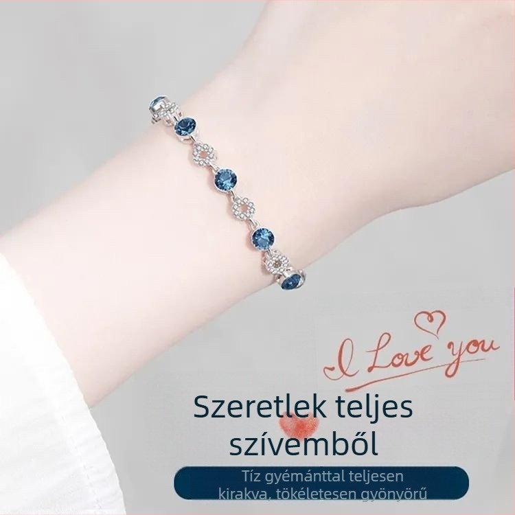 Igazolt ezüst 999 női karkötő kristályos Óceán Szívével, platina színű felülettel, cirkón