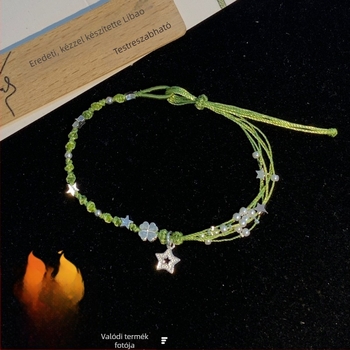 Sterling ezüst négylevelű lóhere, motívumokkal csillag és virág, kézzel fonott zsinóros karkötő, erdei nyári stílusú ékszer.