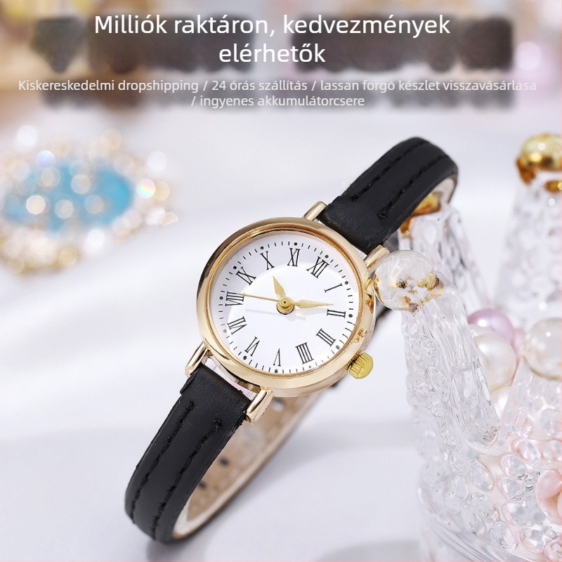 Női kvarcóra vékony PU-szíjjal, retro stílusú, kerek számlappal és római számokkal; tokozat: cinkötvözet, átmérő 23 mm, vastagság 7 mm.