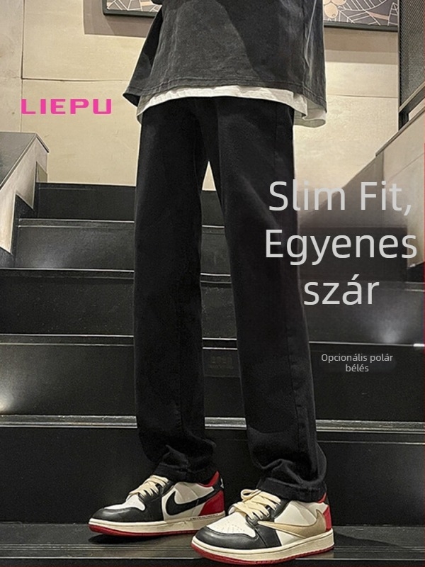 Fekete férfi denimnadrág, lazán szabott egyenes szabás, téli hosszú nadrág görbült részletekkel