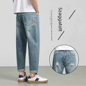 Férfi denim cropped nadrág szakadt részletekkel, laza harém fazon, 9/10 hossz, tavasz 2026