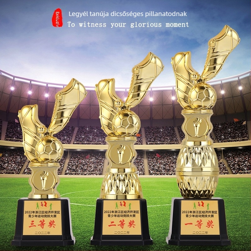 Labdarúgó-trofea cipő alakú figurával, gravírozott csapatért járó díj, műanyag trofea gyerekeknek