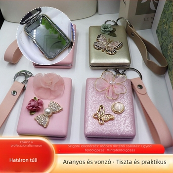 Hordozható, összecsukható sminktükör bőrpánttal, kétoldalas nagyítással