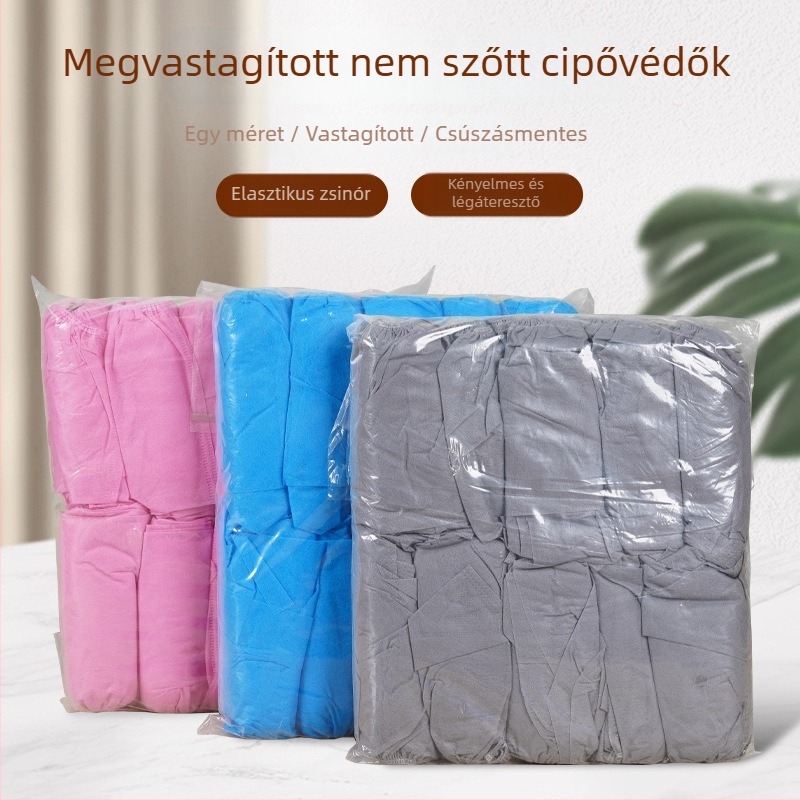 Egyszer használatos, nem szövött anyagból készült cipővédők, vastított és kopásálló, beltéri otthoni használatra, vízálló és csúszásmentes, húzható kialakítás vendégek számára