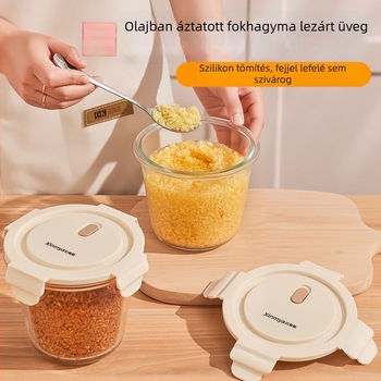 Kerek üvegű hűtőszekrényhez való tároló fedővel, széles nyílással, olajba áztatott fokhagyma