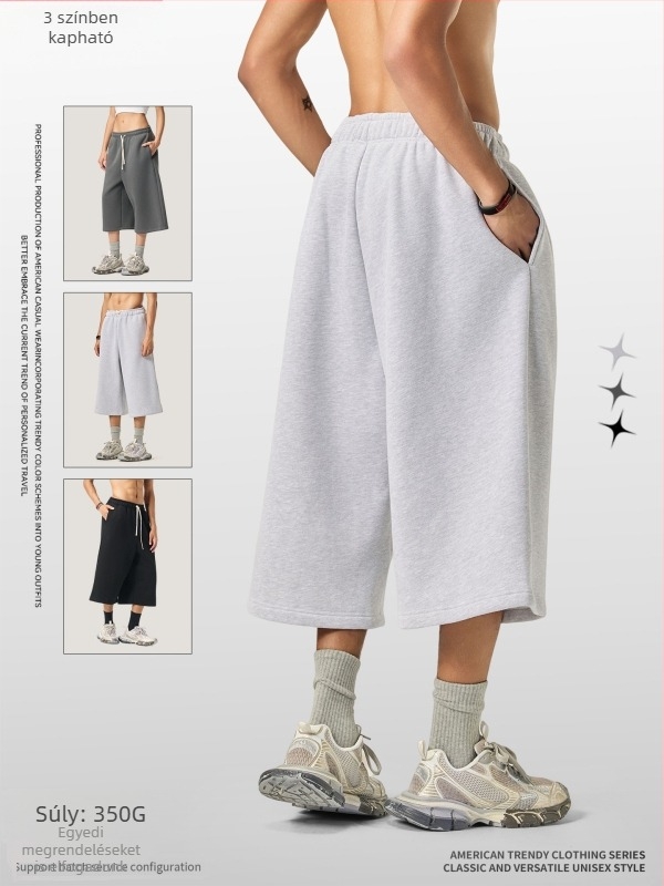 Férfiaknak lazán szabott cropped szélesszárú melegítőnadrág fleece béléssel, egyszínű, téli