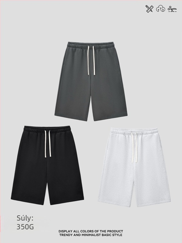 Férfiaknak lazán szabott cropped szélesszárú melegítőnadrág fleece béléssel, egyszínű, téli