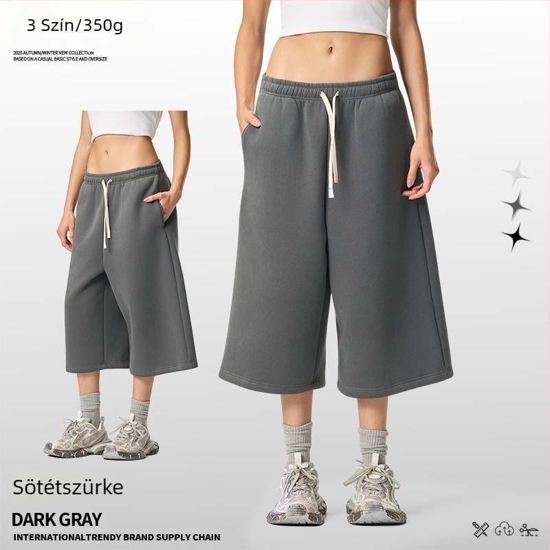 Férfiaknak lazán szabott cropped szélesszárú melegítőnadrág fleece béléssel, egyszínű, téli