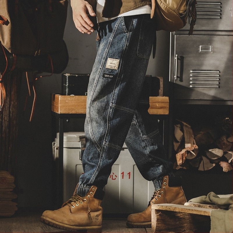 Férfi denim nadrág, mosott pamutból, lazán szabott, széles szárú, patchwork részletekkel, tavasz–ősz