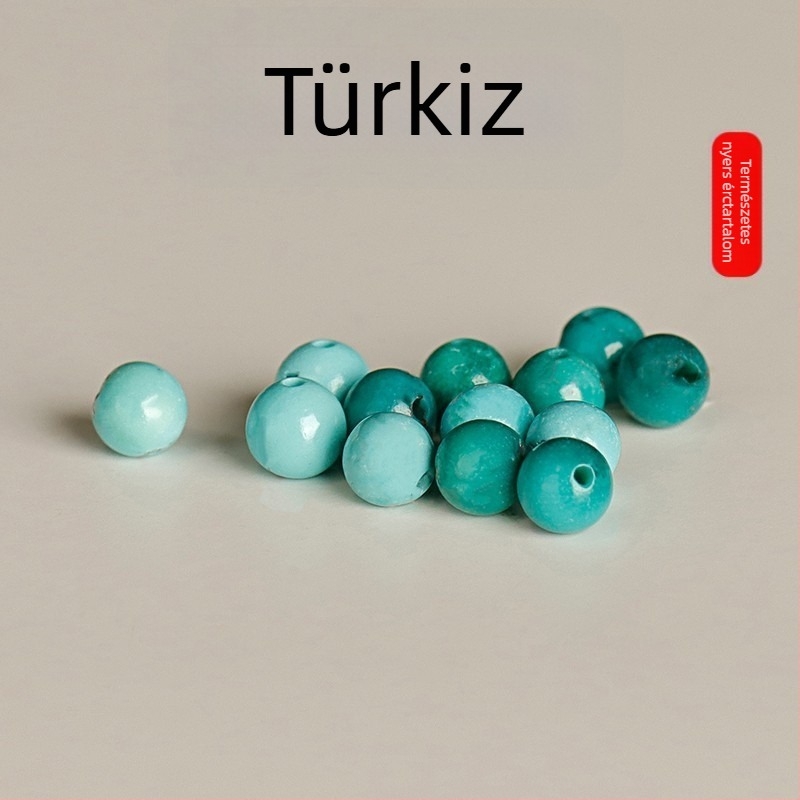 Természetes türkiz gyöngyökből készült karkötő sötétkék gyöngyökkel