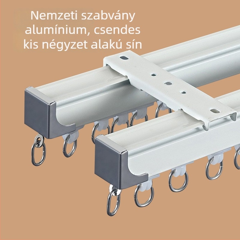 Alumínium‑ötvözetből készült hangtalan függöny sín, csúszó vezetőkkel, 6,7 m hosszú