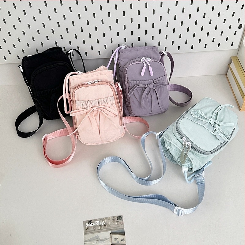 Női vízálló nylon crossbody táska, közepes méretű, vödör-stílusú, cipzár, zseb a telefonnak, mindennapi használatra, nagy kapacitás