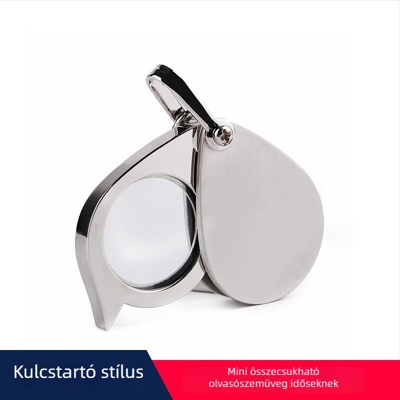 Kisméretű, összecsukható, hordozható nagyító fém kulcstartóban, olvasáshoz könyvek és újságok.