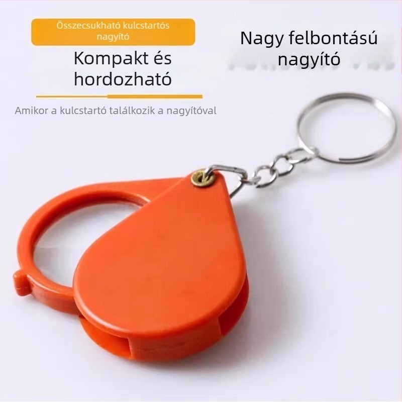 Kisméretű, összecsukható, hordozható nagyító fém kulcstartóban, olvasáshoz könyvek és újságok.