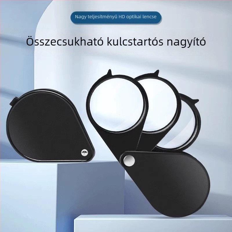 Kisméretű, összecsukható, hordozható nagyító fém kulcstartóban, olvasáshoz könyvek és újságok.