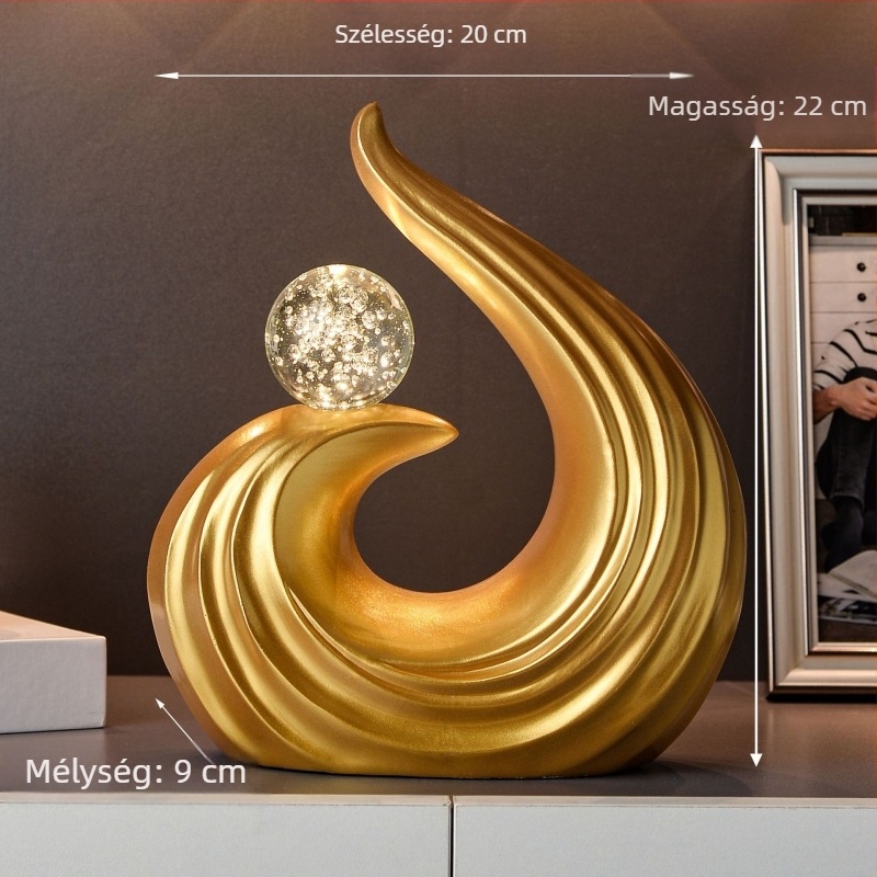 Modern fekete gyantaív aranyozott golyóval, asztali dísz