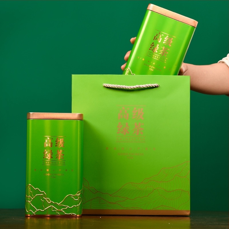 Lézerrel gravírozott teásdoboz fémből, tájkép mintával, nyomtatott logóval, 0,5 kg kapacitás, Green Water Green Mountain márka