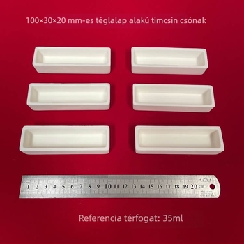Xingyi márkájú téglalap alakú korund edény, 35 ml űrtartalommal, méretek 100 × 30 × 20 mm, fedővel
