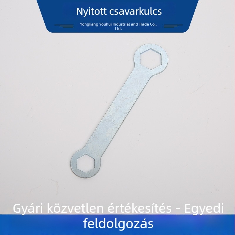 Kétfejű nyitott végű kulcs, szilva virág motívummal, metrikus