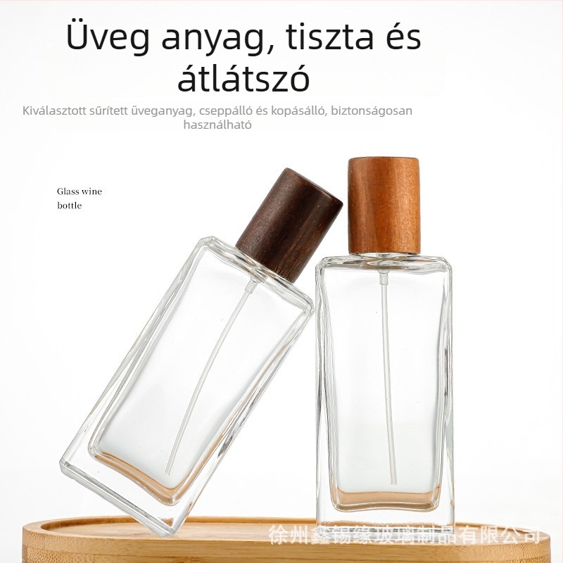 50 ml-es négyszögletes üvegparfümös flakon egyedi fa-textúrájú záróval és permetezővel – hordozható kozmetikai üveg