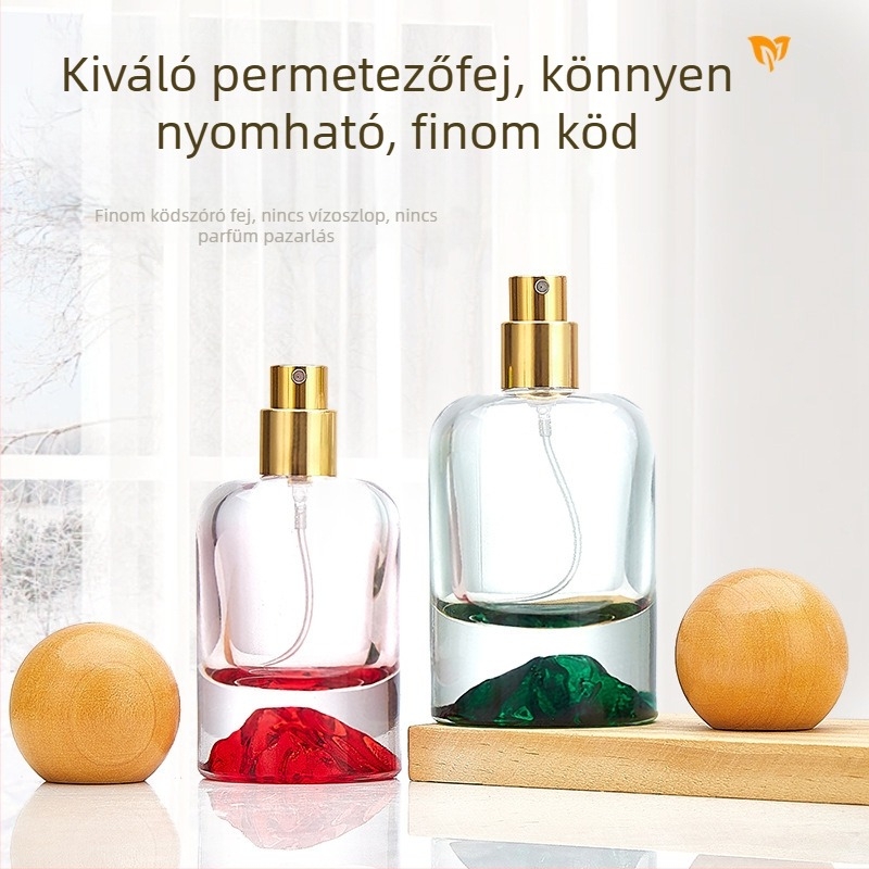Vulkán-alapú hengeres parfümös üveg, 30 ml, átlátszó, színes díszítéssel, permetező fej
