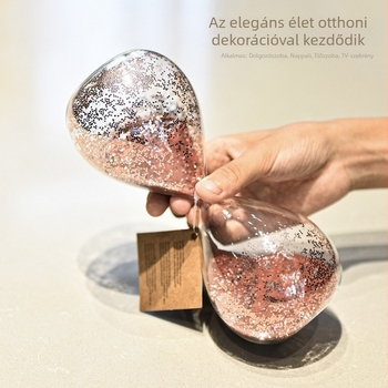 Rózsaszín üveg homokóra paillettes díszítéssel – modern otthoni dekoráció az íróasztalhoz