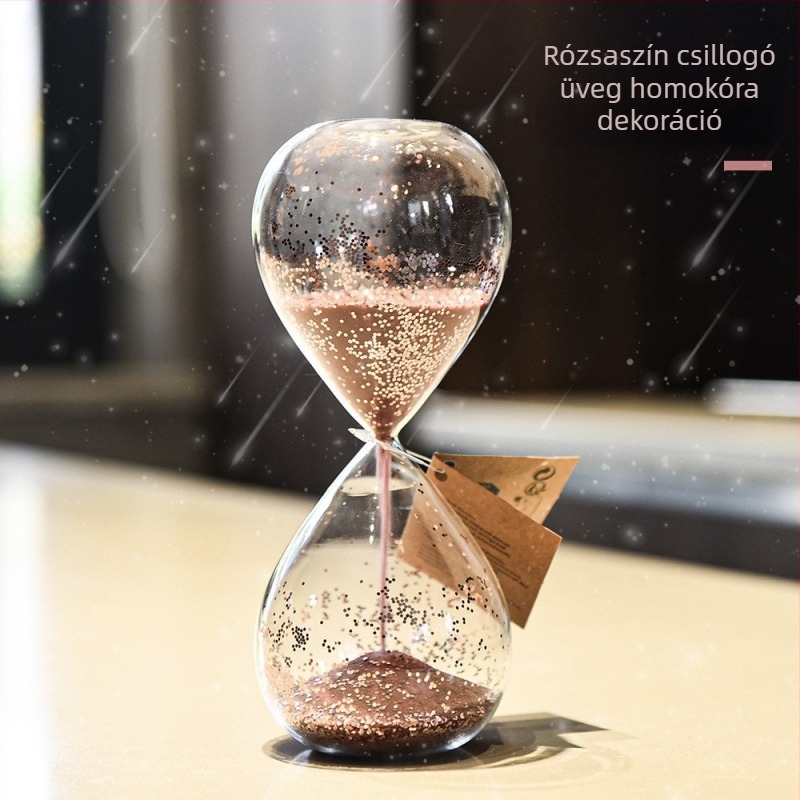 Rózsaszín üveg homokóra paillettes díszítéssel – modern otthoni dekoráció az íróasztalhoz