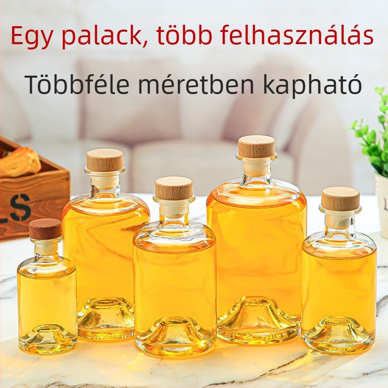 Konkáv aljú üveg gyümölcs- és zöld szilvaborhoz, átlátszó üveg otthon készített zöld szilvaborhoz, gyümölcslé és italokhoz, lezárt üres üveg alkohollal
