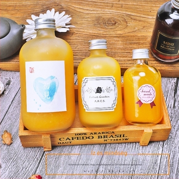 Személyre szabott matt üveg italos palack – gyümölcslé, tej-tea és házi likőr számára, kör alakú zárható üveg (150ml–500ml)