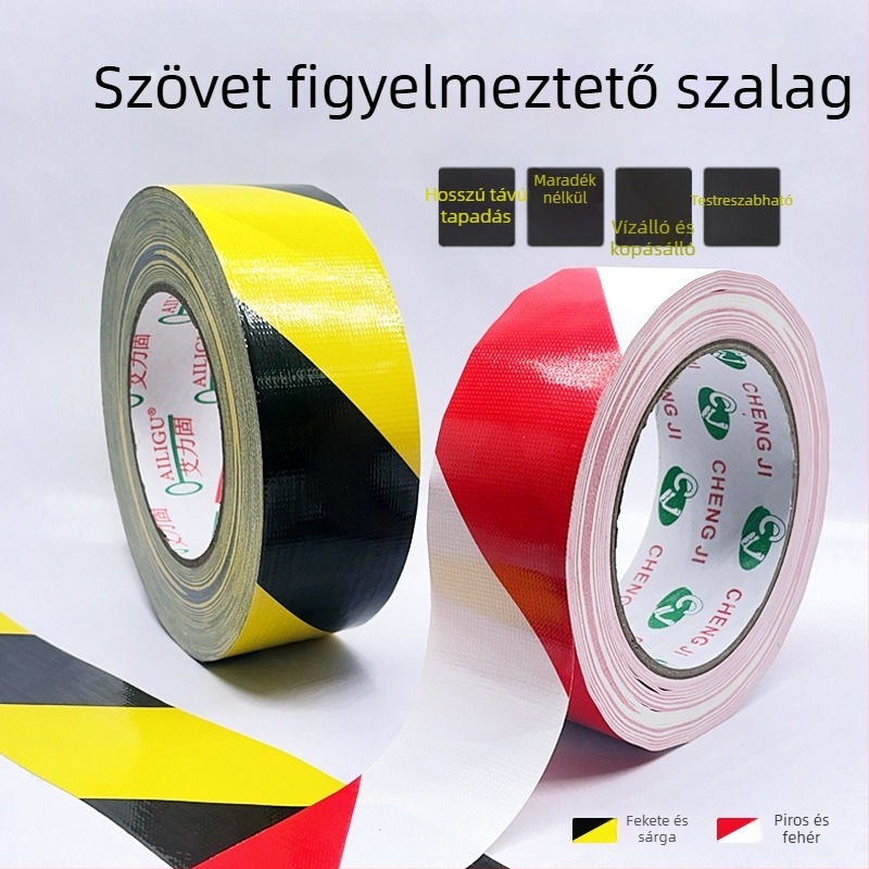 Egyrétegű textil alapú fekete‑sárga zebra padlójelző szalag, hátoldali ragasztóval, vízálló, ipari használatra