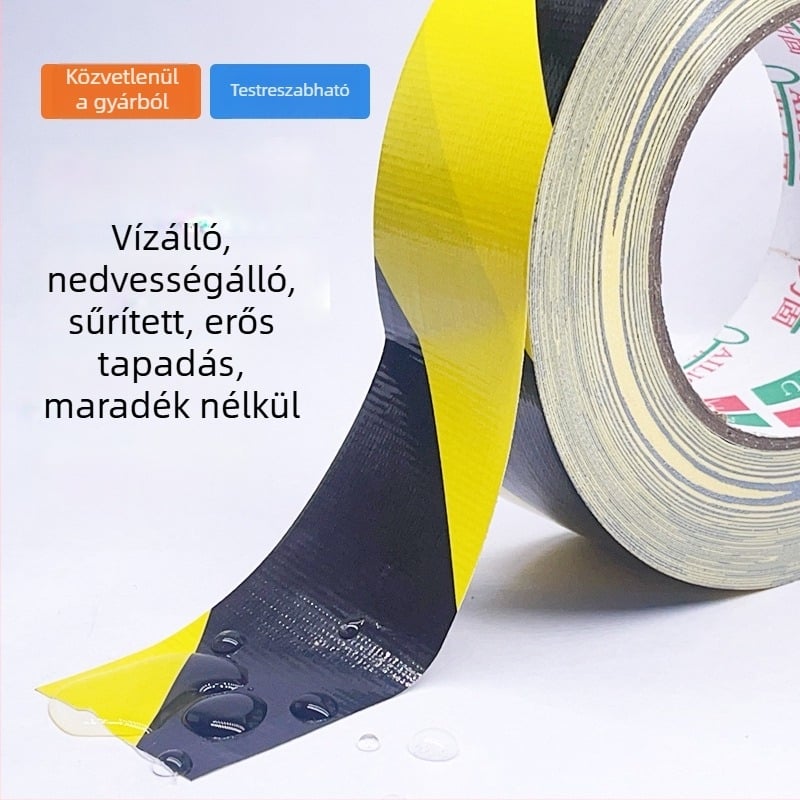 Egyrétegű textil alapú fekete‑sárga zebra padlójelző szalag, hátoldali ragasztóval, vízálló, ipari használatra