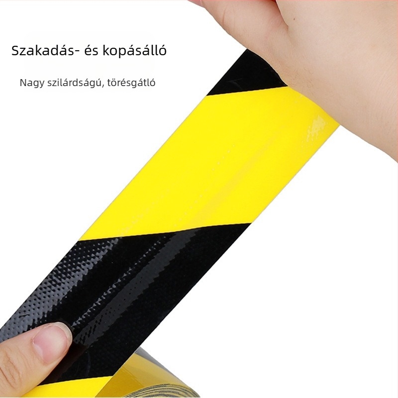 Egyrétegű textil alapú fekete‑sárga zebra padlójelző szalag, hátoldali ragasztóval, vízálló, ipari használatra