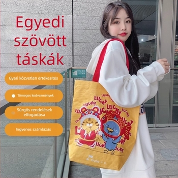 Rendkívül nagy szövött táska vállon átívelő pánttal, kígyóbőr mintázatú, egyedi készítésű