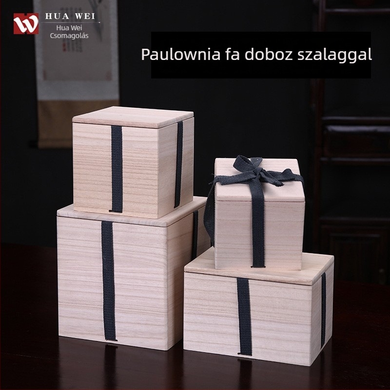 Paulowniafából készült gravírozott ajándékdoboz Jian ware teáskannának, teáscsészéknek és porcelán vázáknak.
