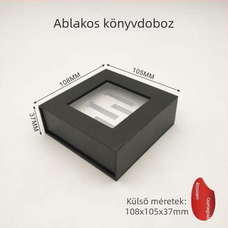 Fekete karton doboz ablakkal és nyitható fedéllel, mágneses könyv alakú belső USB-memóriához és Bluetooth fejhallgatóhoz